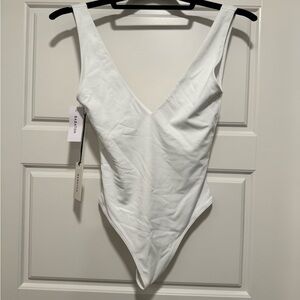 Aritzia White Bodysuit size xs never worn